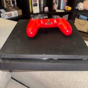 Sony Black Console with Red Controller